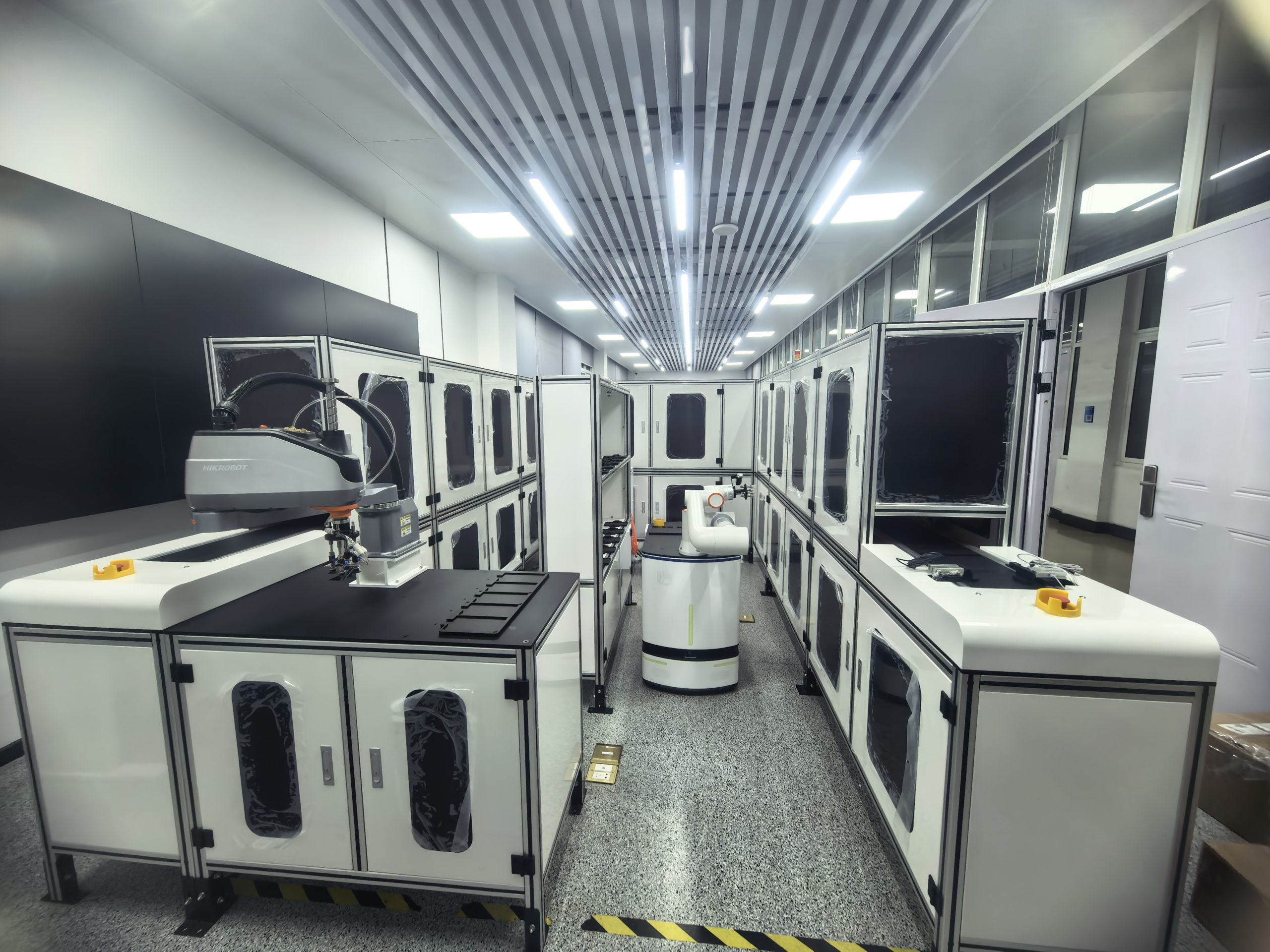 Smart Manufacturing Education laboratory with AI and robotics training systems